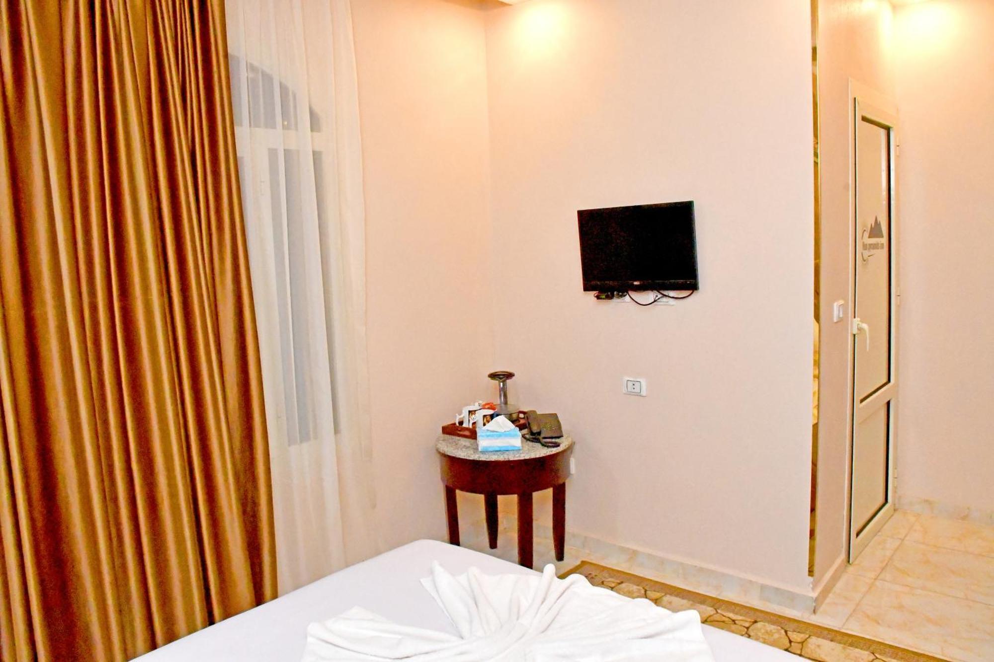 Nun Pyramids Hotel Kafret el-Gabal الغرفة الصورة